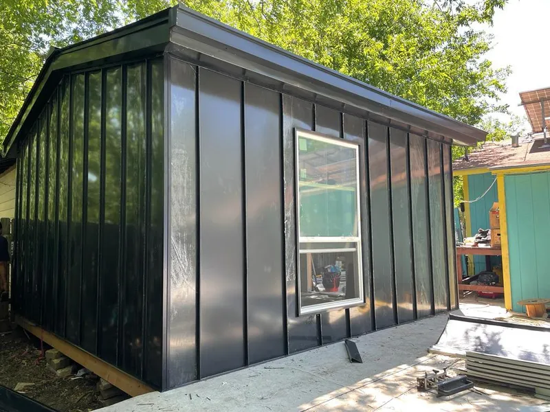 Black standing seam metal wall panels for Metal Roof Installation in Bedford